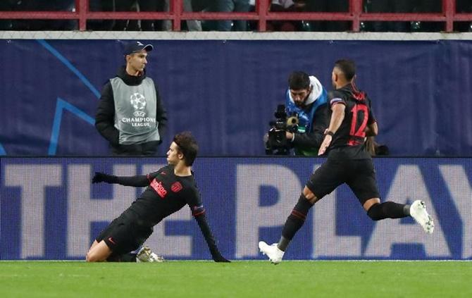 Joao Felix celebrates scoring Atletico Madrid's first goal against Lokomotiv Moscow.