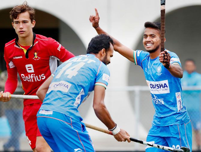 India's Vivek Sagar Prasad celebrates with teammates after scoring against Belgium during match 5 of their Tour of Belgium, in Antwerp, on Thursday. India beat Belgium 5-1 in the fifth and last match to maintain their 100% record on the tour