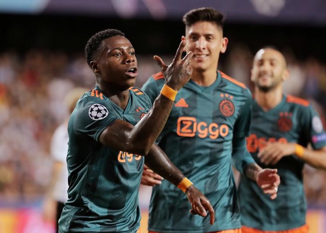 Quincy Promes celebrates scoring Ajax's second goal against Valencia.