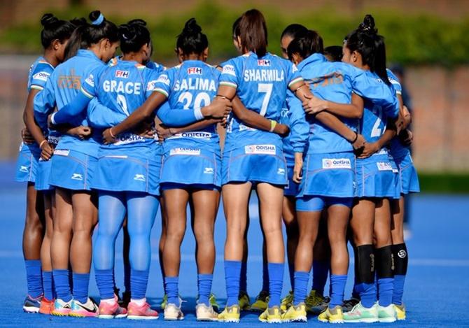 India’s players get into a huddle ahead of their last England tour match against Great Britain, in Marlow, on Friday