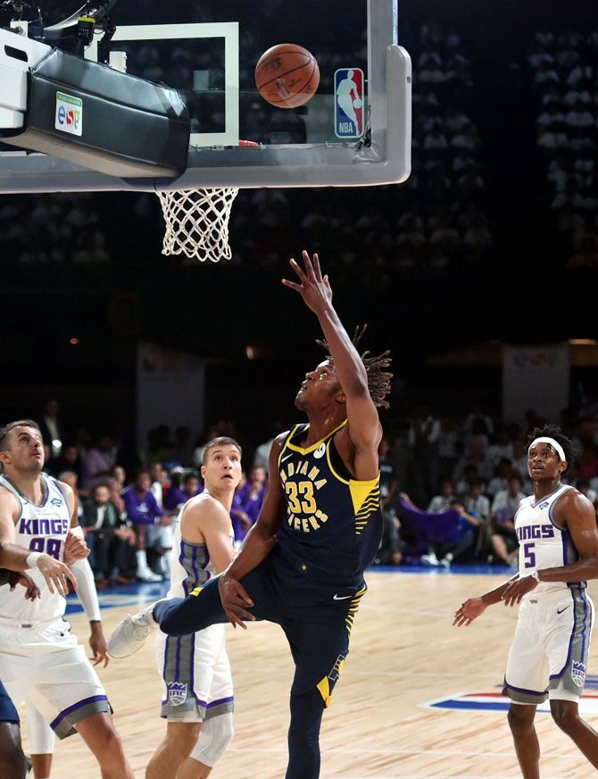 Indiana Pacers's Myles Turner (Jersey no. 33) scores a basket against Sacramento Kings on Friday
