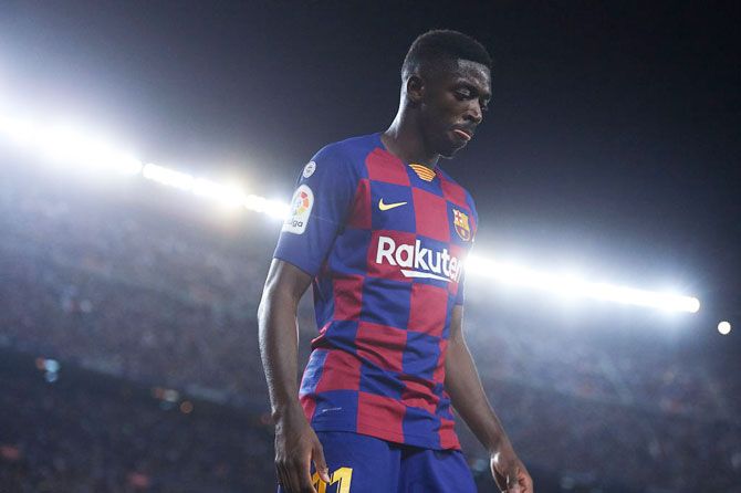 FC Barcelona'S Ousmane Dembele Walks off after being shown the red card