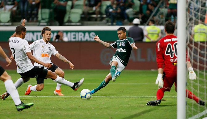 Palmeiras' Dudu scores the opening goal against Atletico Mineiro during their Brasileirao Series A match at Allianz Parque in Sao Paulo, Brazil, on Sunday