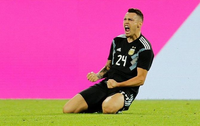 Lucas Ocampos celebrates scoring Argentina's second goal in Wednesday's international friendly against Germany in Dortmund.