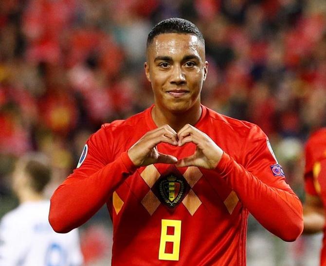 Youri Tielemans celebrates scoring Belgium's sixth goal.