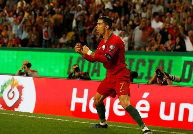 Cristiano Ronaldo celebrates scoring Portugal's second goal against Luxembourg.