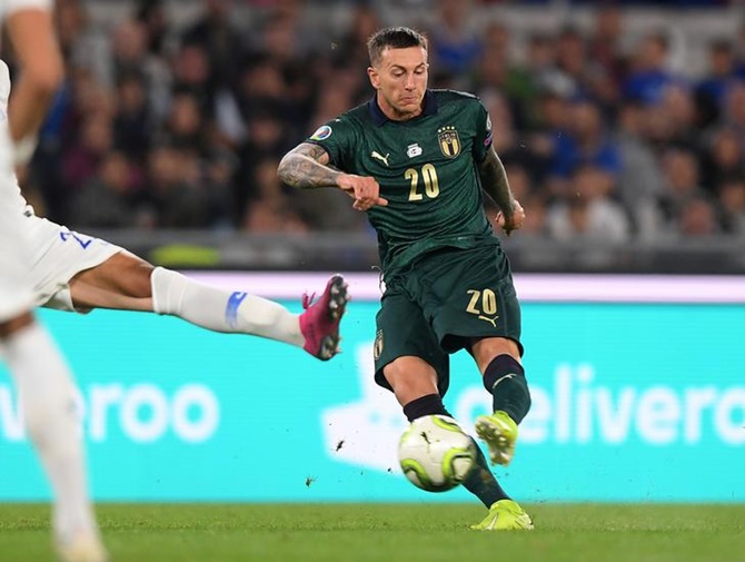 Federico Bernardeschi scores Italy's second goal.