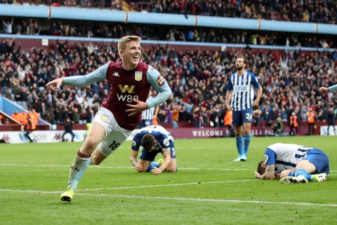 Aston Villa's Matt Targett celebrates after scoring his team's second goal against Brighton & Hove Albion at Villa Park in Birmingham