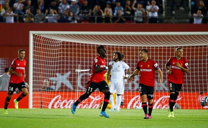 Lago Junior celebrates scoring Mallorca's only goal in the La Liga match against  Real Mallorca at Iberostar Stadium, in Palma, Spain, on Saturday.