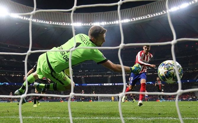 Alvaro Morata scores the all-important goal for Atletico Madrid in the Group D match against Bayer Leverkusen