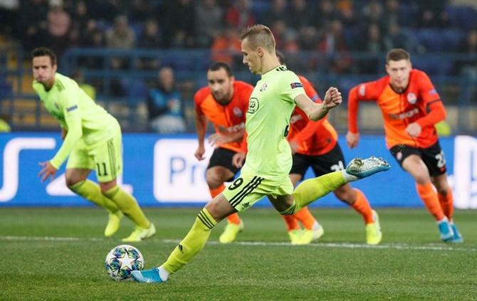 Mislav Orsic scores Dinamo Zagreb's second goal from the penalty spot during the Group C match against Shakhtar Donetsk