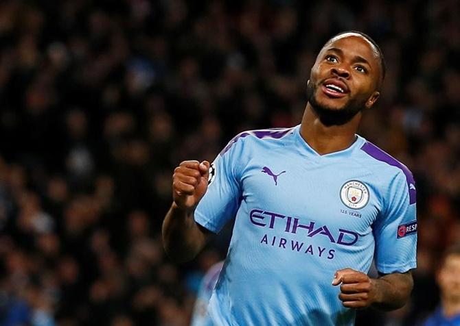 Raheem Sterling celebrates scoring Manchester City's third goal during Tuesday's Champions League Group C match against Atalanta