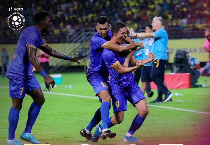 Mumbai City players celebrate after Amine Chermiti scores.