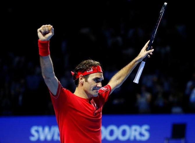 Switzerland's Roger Federer celebrates beating Australia's Alex de Minaur in the final of the Swiss Indoors Basel.