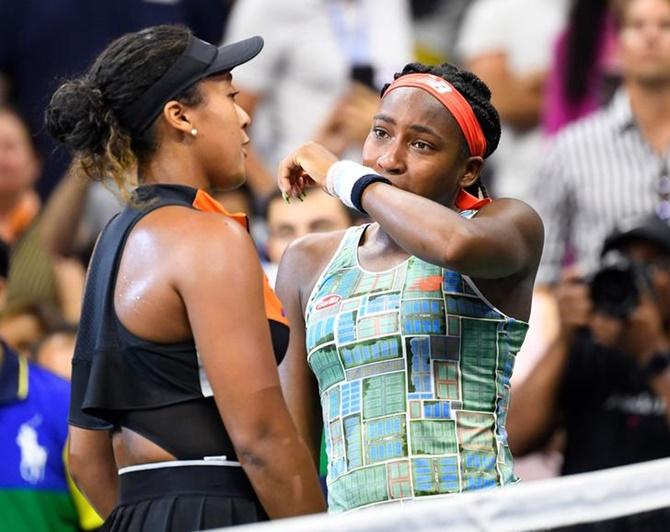 Naomi Osaka, left, consoles Coco Gauff after their third round match.