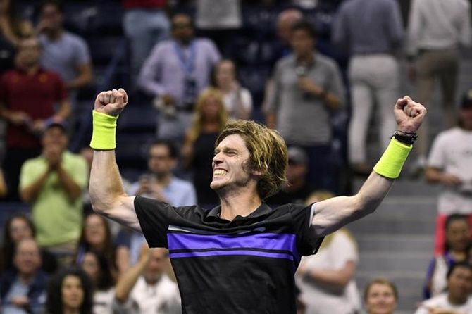 Andrey Rublev celebrates victory over Nick Kyrgios in the third round.