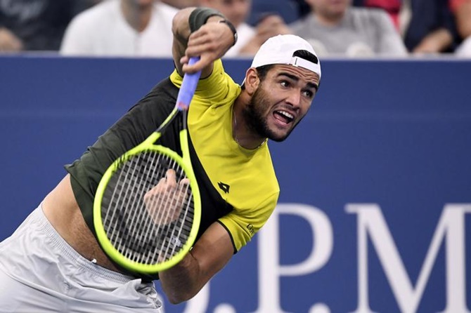 Matteo Berrettini serves to Andrey Rublev in their fourth round match.