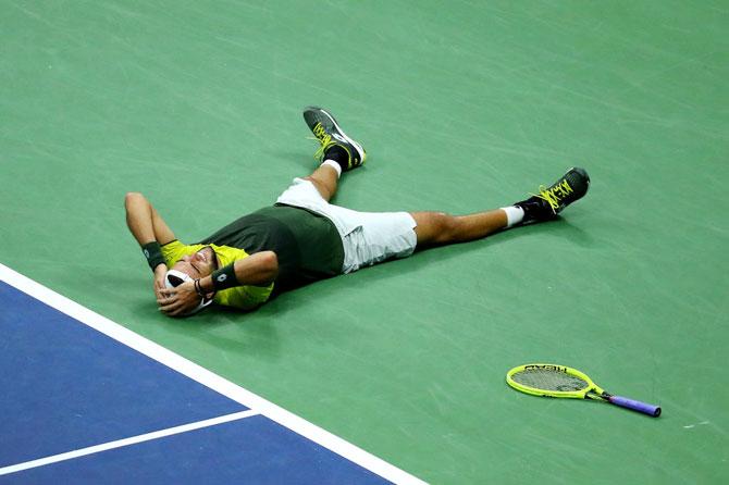 Italy's Matteo Berrettini celebrates after defeating Frenchman Gael Monfils in the US Open quarter-final on day ten of the 2019 US Open at the USTA Billie Jean King National Tennis Center at Flushing Meadows in the Queens borough of New York City on Wednesday