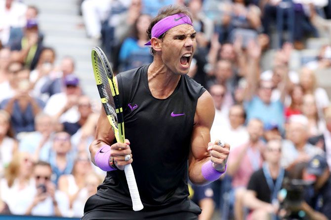Spain's Rafael Nadal celebrates winning set point during his US Open final against of Russia's Daniil Medvedev at the USTA Billie Jean King National Tennis Center at Flusing Meadows in the Queens borough of New York City on Sunday