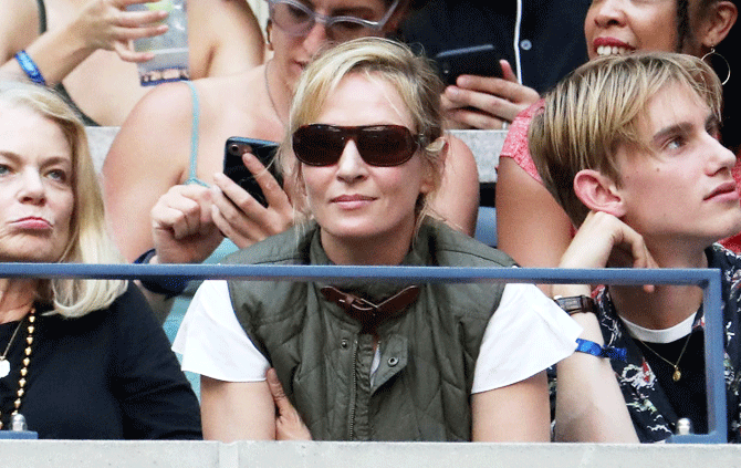 Ace actress Uma Thurman watches intensely