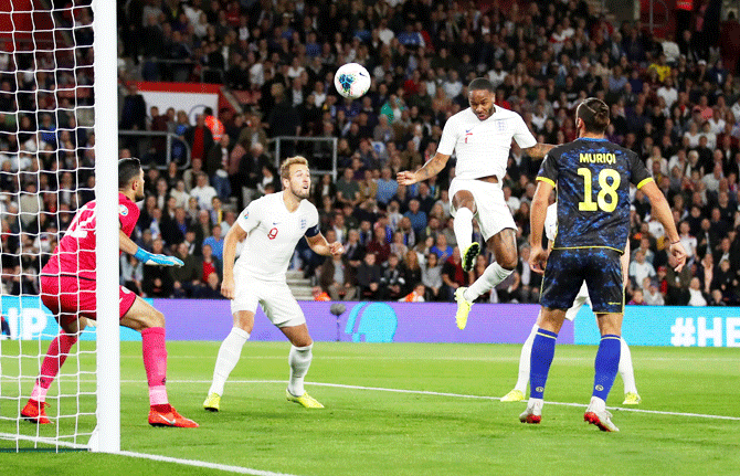 England's Raheem Sterling rises to head a goal into the net during their Euro 2020 Qualifier Group A match against Kosovo at St Mary's Stadium, in Southampton, Britain on Tuesday