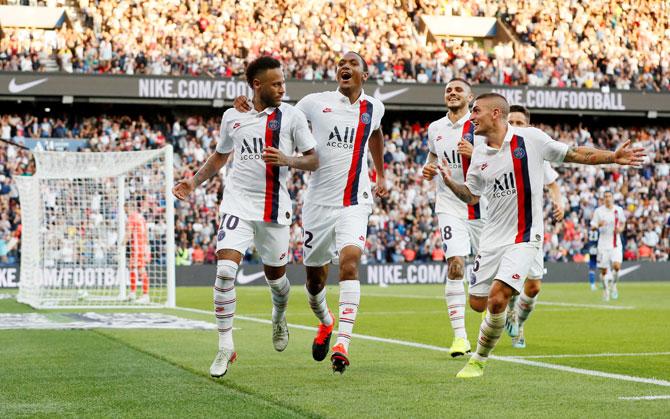 Paris St Germain's Neymar celebrates with Abdou Diallo, Mauro Icardi and Marco Verratti on scoring their first goal against RC Strasbourg at Parc des Princes in Paris