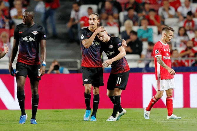 RB Leipzig's Timo Werner celebrates with Yussuf Poulsen on scoring their first goal against Benfica in their Group G match at Estadio da Luz, Lisbon