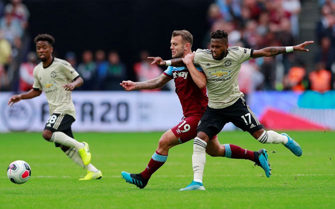 West Ham United's Jack Wilshere and Manchester United's Fred vie for possession