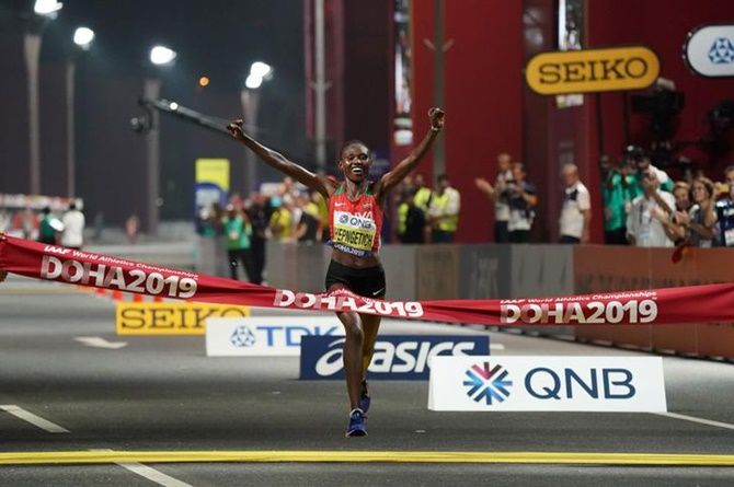 Kenya's Ruth Chepngetich celebrates after winning the women's marathon at the Corniche during the IAAF World Athletics Championships on Friday night.