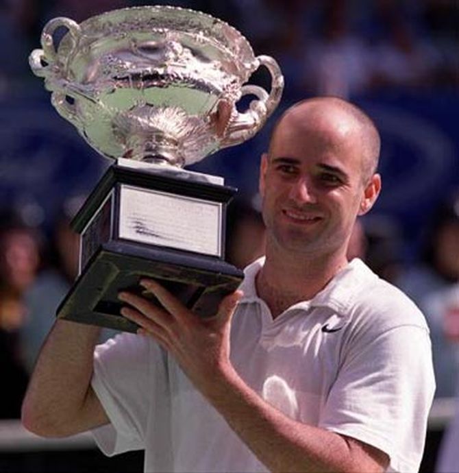 Andre Agassi with the Australian Open trophy in 2000