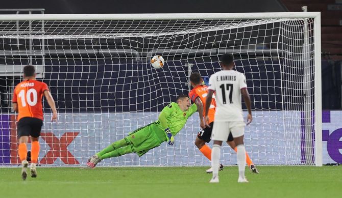 Shakhtar Donetsk's Alan Patrick scores their third goal from the penalty spot