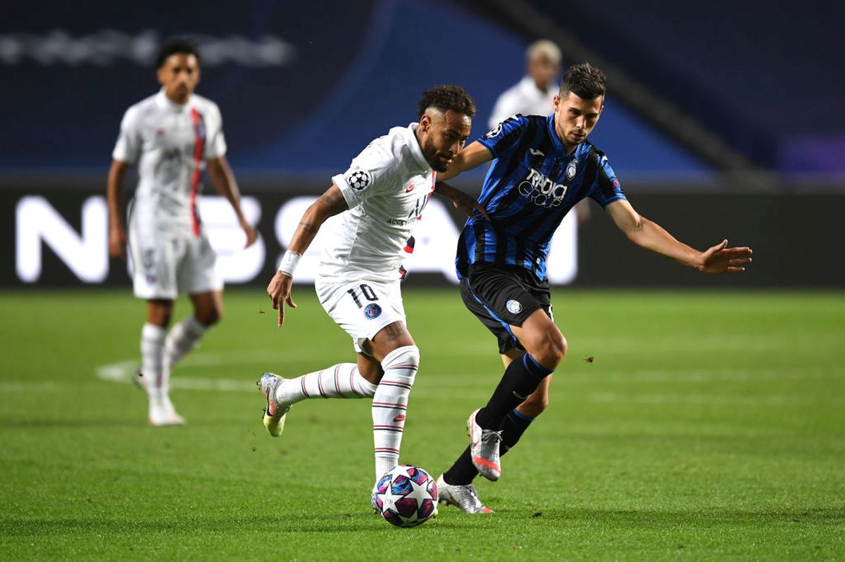 PSG's Neymar is challenged by Atalanta's Remo Freuler