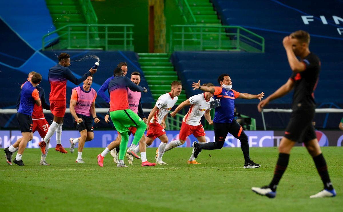 RB Leipzig players and staff go ballistic after winning the match