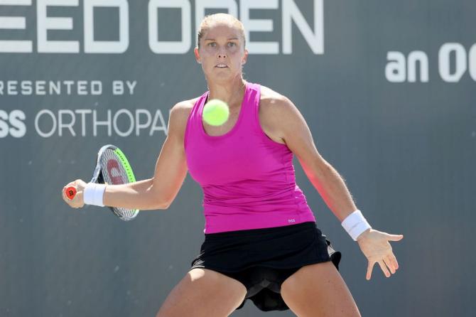 Shelby Rogers plays a forehand during her match against Serena Williams during Top Seed Open at the Top Seed Tennis Club in Lexington on Friday