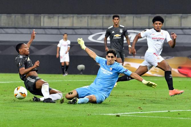 Sevilla FC's Yassine Bono denies Manchester United's Anthony Martial during the UEFA Europa League semi-final at RheinEnergieStadion in Cologne, Germany, on Sunday