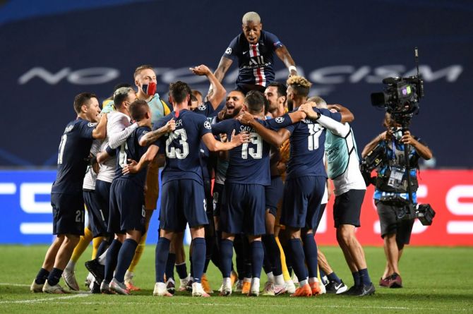 Paris St Germain players celebrate their win after the match