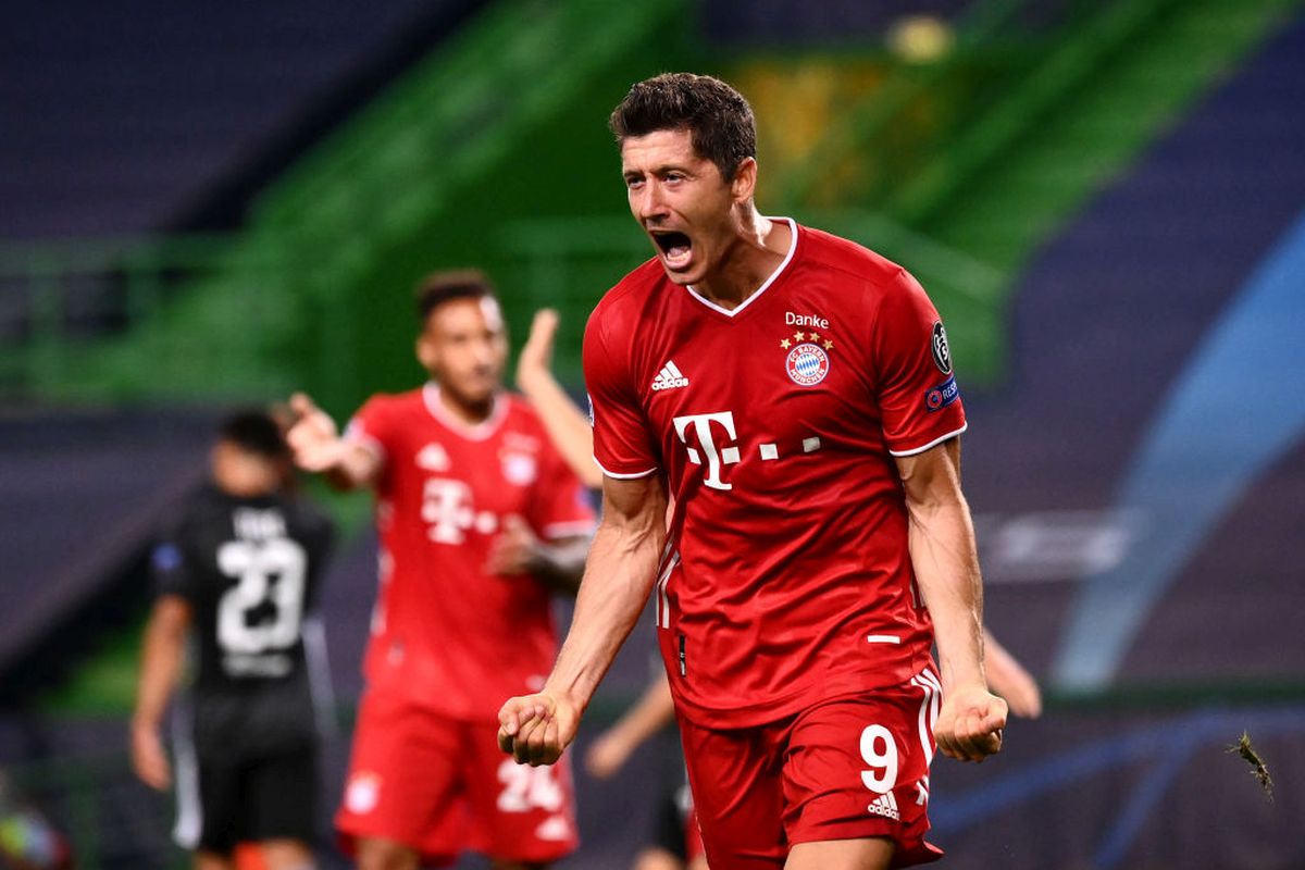 Bayern Munich's Robert Lewandowski celebrates on scoring against Olympique Lyonnaise during their Champions League match in Lisbon on Wednesday