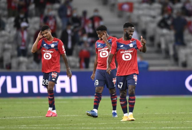 Lille's Jo Bamba (right) is all smiles after their match against Stade Rennais