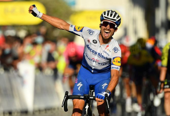 Julian Alaphilippe prevailed in a three-man sprint ahead of Swiss Marc Hirschi and Briton Adam Yates to win the yellow jersey on Sunday 
