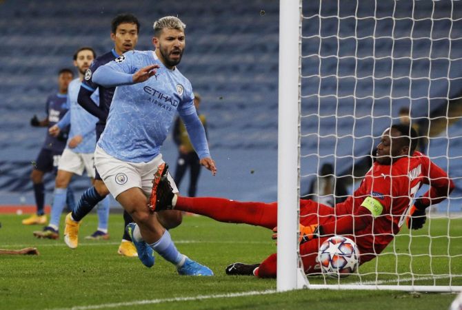 Manchester City's Sergio Aguero scores their second goal against Olympique de Marseille during their Champions League Group C match at Etihad Stadium, Manchester