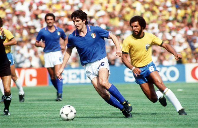 Italy's Paolo Rossi gets away from Brazil's Junior during the 1982 FIFA World Cup second phase group 4 match in Estadio Sarria, Barcelona, July 5, 1982