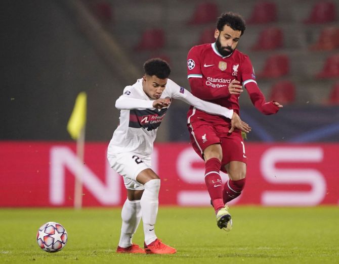 Liverpool's Mohamed Salah in action with FC Midtjylland's Paulinho Ritzau during their Champions League Group D match at MCH Arena, Herning, Denmark. 
