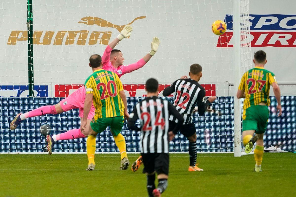 Newcastle United's Dwight Gayle scores their second goal against West Bromwich Albion at St James' Park in Newcastle