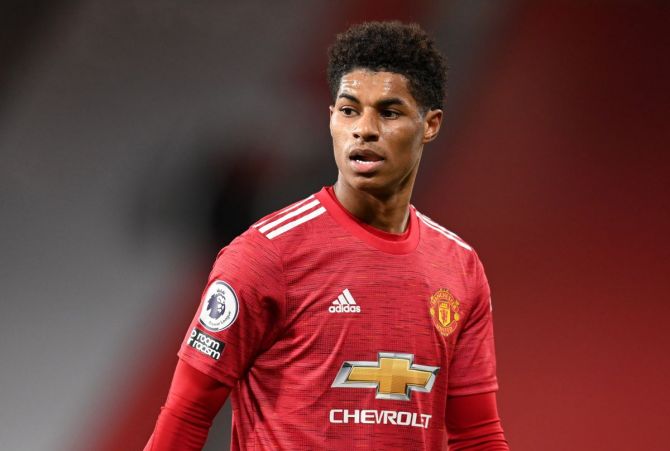 Manchester United forward Marcus Rashford said his family's struggles when he was younger had made him more determined to help others.
