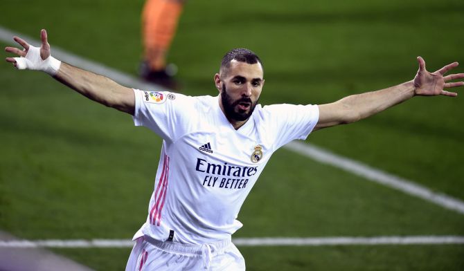 Karim Benzema, who played in Ukraine on Tuesday night in his club's 5-0 Champions League group stage win over Shakhtar Donetsk, was not in the court for the start of the trial because of professional obligations, said his lawyer, who has described the case against him as "absurd".
