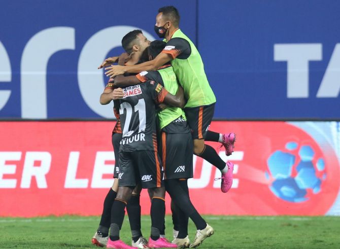 FC Goa players celebrate after Igor Angulo nets the stoppage-time winner during their Indian Super League match against Jamshedpur FC in Vasco, Goa on Wednesday