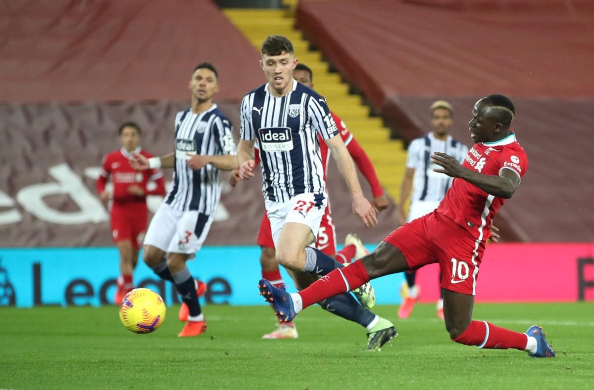 Sadio Mane scores for Liverpool during the Premier League match against West Bromwich Albion, at Anfield, on Sunday.