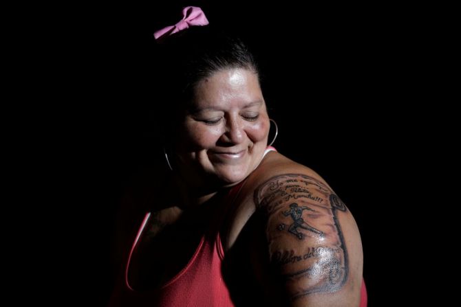 Cintia Veronica has an image of Maradona tattooed on her arm