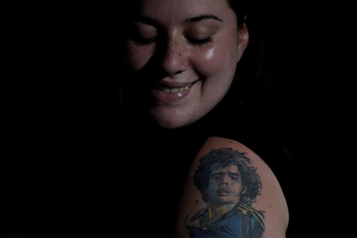 Nerea Barbosa poses for a photo at her home in Buenos Aires.  "It is love, it is my great love, my passion to have Diego (on my body) so he is always with me everywhere. I feel like he protects me," said Barbosa. 