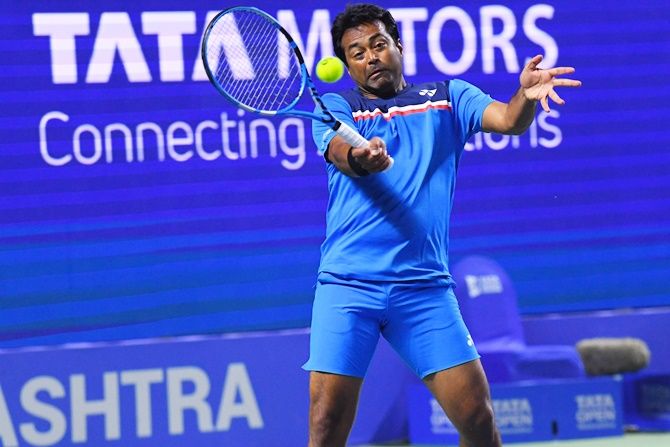 Leander Paes in action against Ramkumar Ramanathan and Purav Raja in the doubles quarter-final at the Tata Open Maharashtra, in Pune on Thursday